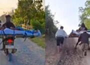 Kisah Haru… Suami Bawa Jasad Istri Pakai Motor, Lewati Jalan Rusak Parah