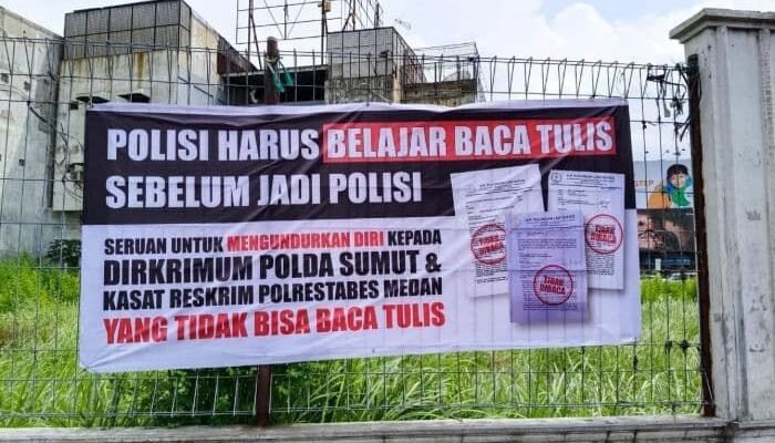 Viral Spanduk Sindir Polisi di Bundaran SIB Medan, Ini Penjelasan Pemasangnya
