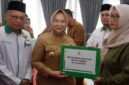 Penyaluran Zakat Triwulan III Baznas bersama Pemkan Langkat, Senin (21/9). Foto: Diskominfo Langkat